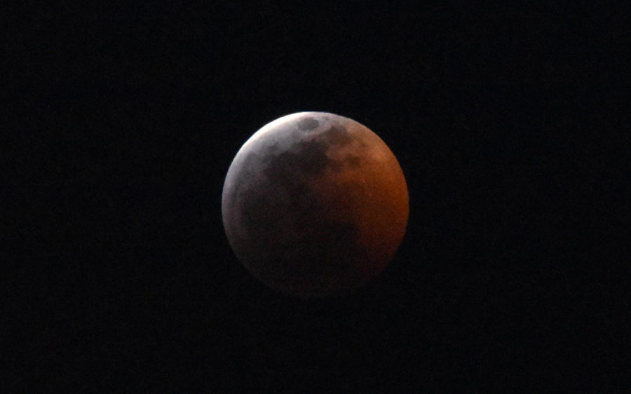 Plane-spotting photographer Dylan P (20) captured this image during a rare lunar eclipse Jan. 20. 