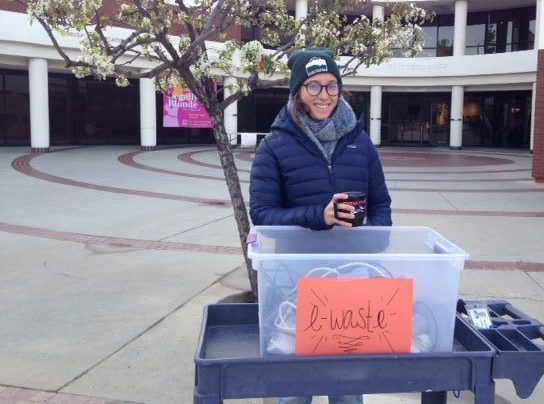 JOFFEE Fellow Stephanie Salem stands in the cold, collecting e-waste to be recycled.