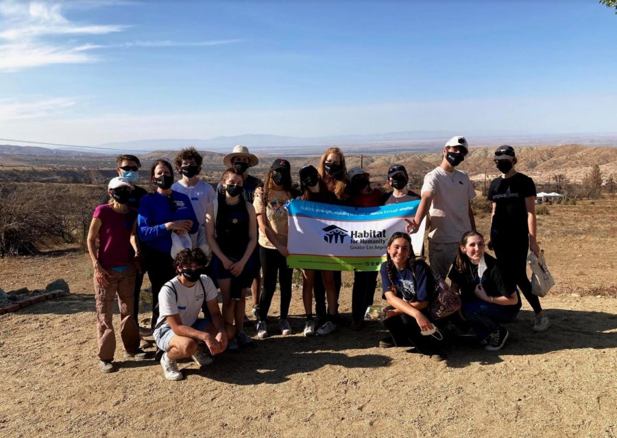 After a long day of restoring land from wildfires with Habitat for Humanity in Pearblossom, CA, the hardworking dTHS students smile for a photo!