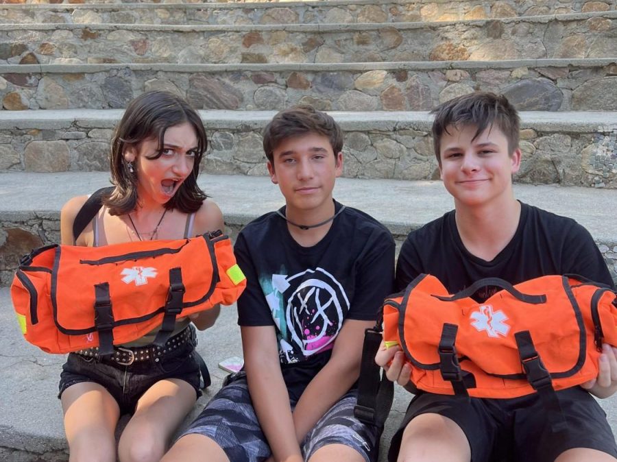 (Left to right) Eden R. 25, Eytan F. 25, and Sam K. 25 are smiling because they got CPR certified on the 10th-grade retreat at Brandeis Bardin Campus Aug. 26-28,2022.