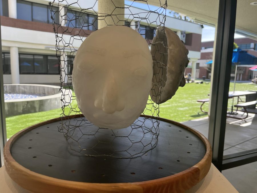 This sculpture, on exhibit Jan. 18, 2023, may look like just a funny face with a big nose, but according to artist Talia P. (24), this is what a real human face looks like. In her artist statement, Talia says we should embrace the physical attributes that are normally looked down upon. 
