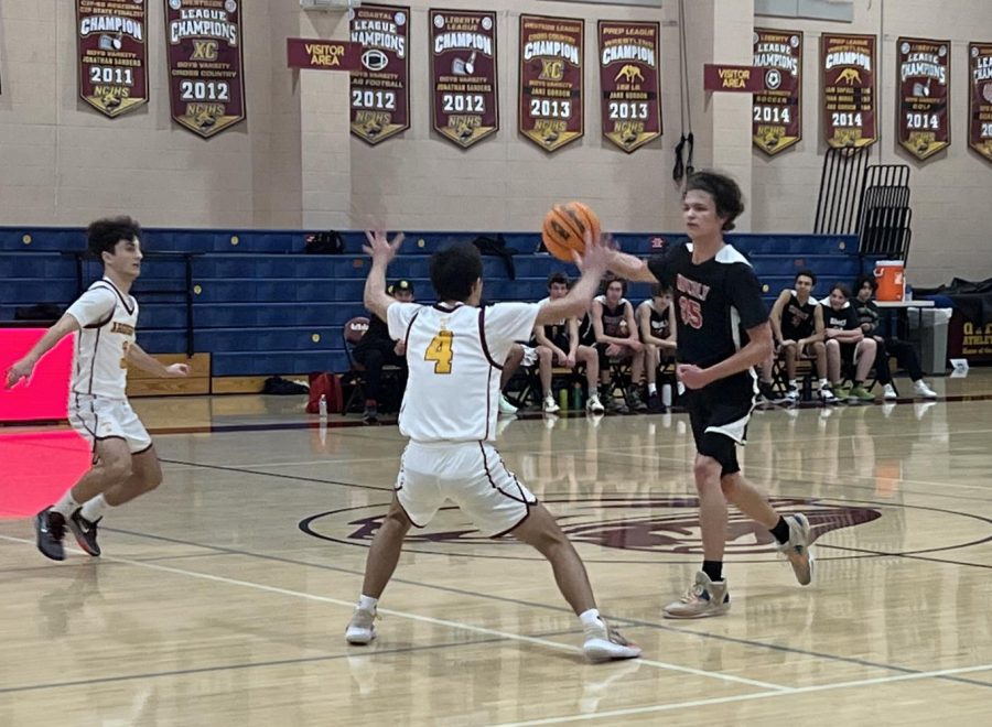 Jake S. 24 (#4) and Daniel W. 23 lead the de Toledo Jaguars to a blowout win against Waverly in a home game Jan. 5, 2023.