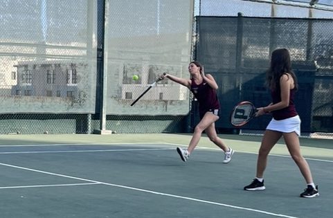 Jane H. 24 (left) and Emma S. 24 play doubles and end victorious with a score of 6-2 against Shalhevet Oct. 23, 2023.