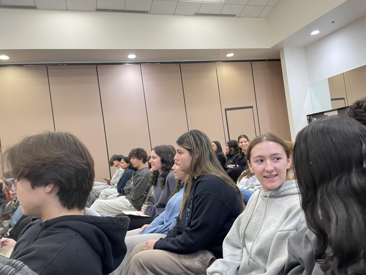 11th grade students sit through a grade-level meeting on Dec. 11, 2024. Attendance at these meetings is mandatory for all students. (Right to left: Avriella R., Joley B., Gabi S., Eden L., Jonah Z.)