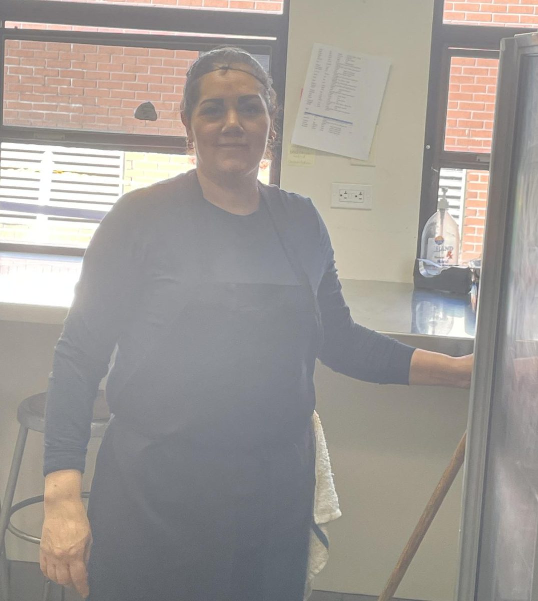 Maria Vargas, Felix's assistant, helps prepare more than 100 student lunches every day.