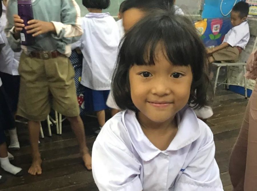A little girl in my third grade class who had only seen a phone on TV, smiles for the camera. She is one of hundreds of students I taught English to during my 2017 trip to Thailand.