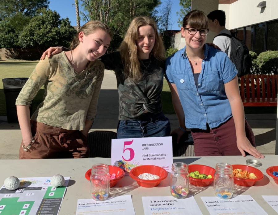 Left to right: Maya S. '20, Sydney G., '20 and deTOP teacher Zoe Fox  help students realize there are mental health problems all around us.