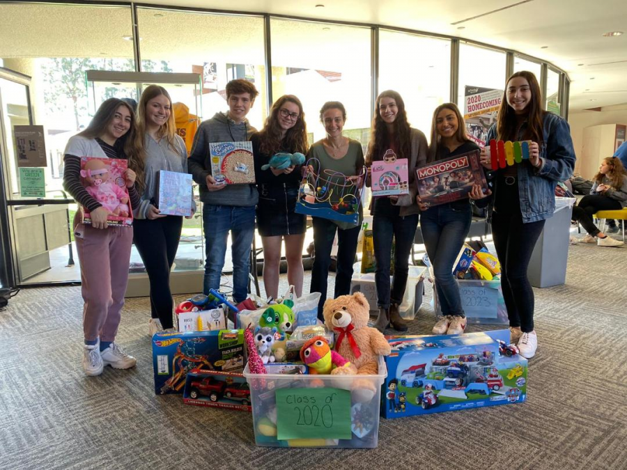 Club ACOA donated toys to Family Rescue Center and the books will be donated to Boys and Girls Club, both in our local communities. (Raquel Safdie, Advisor)