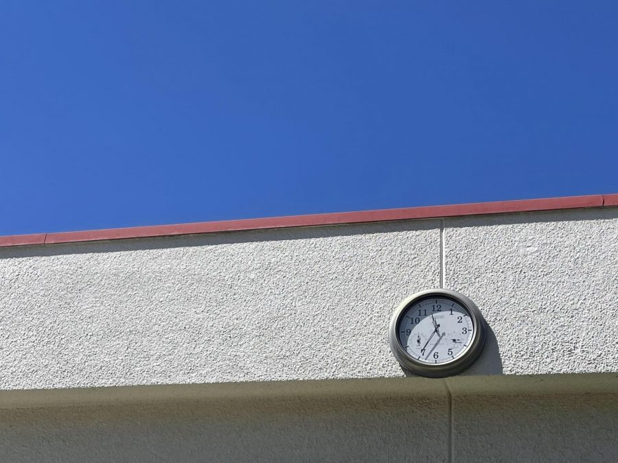 During+the+first+week+of+school%2C+I+took+this+picture+of+a+clock+in+the+quad+area+in+front+of+a+cloudless+sky.+The+wall+holding+the+clock+looks+as+if+it+is+connected+to+the+sky.++With+the+solid+blue+color+of+the+sky%2C+it+looks+like+it+was+painted+on.+