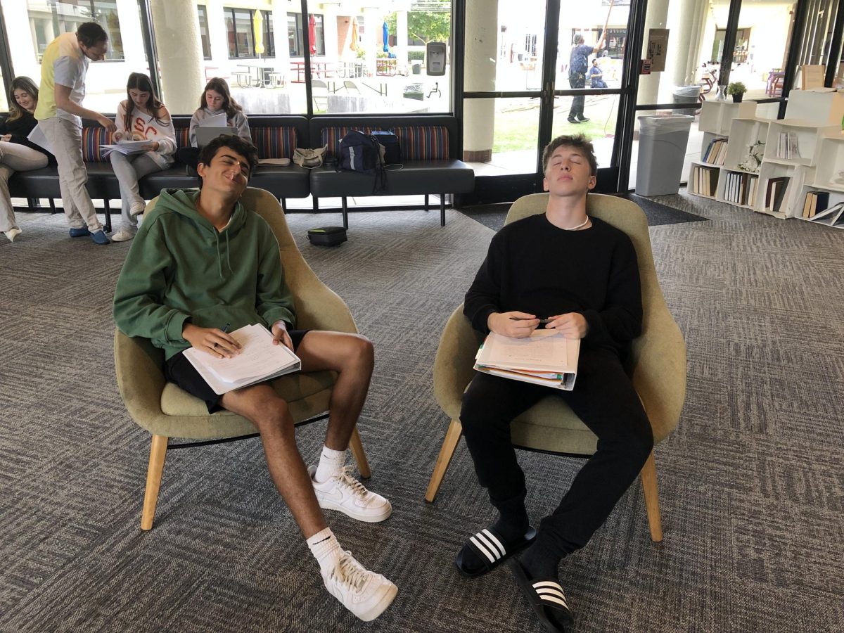 Editor’s picks: Best place to take a nap. Seniors (add names) take a nap on chairs in the downstairs lobby during Rabbi Greenfield’s class Sept. 21, 2023, while (names)  - what are they doing?)