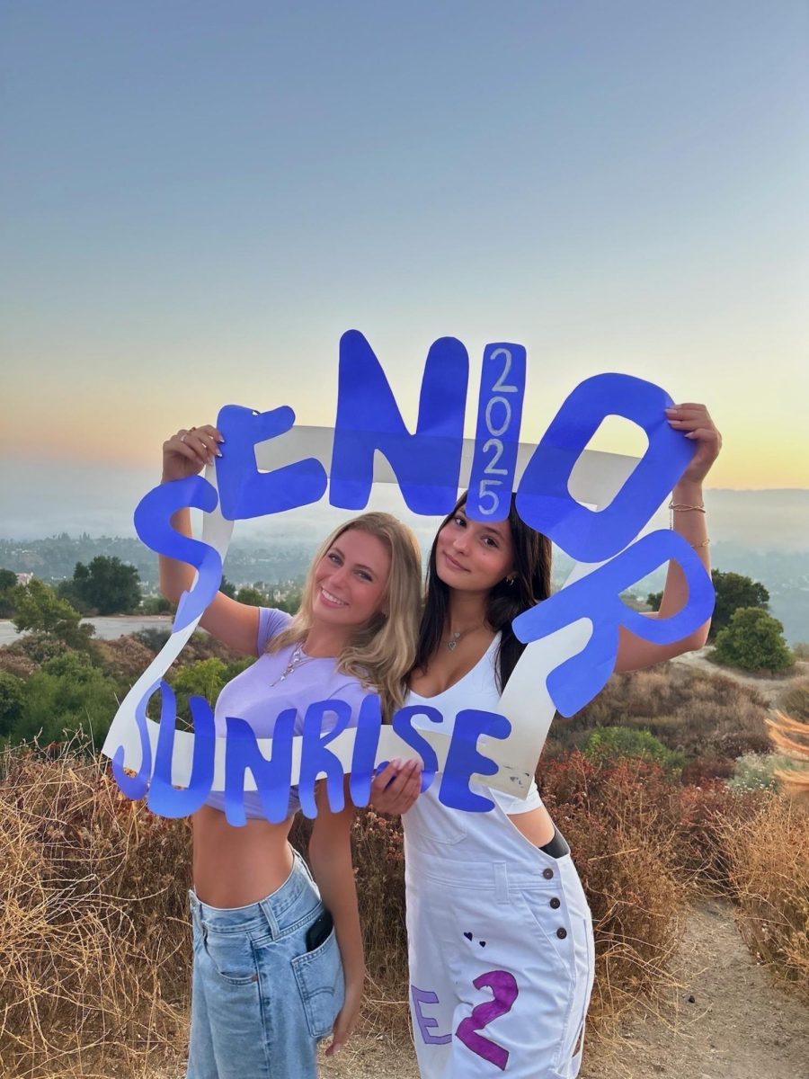 Schwartz poses next to Ava B. ('25) at Senior Sunrise. 