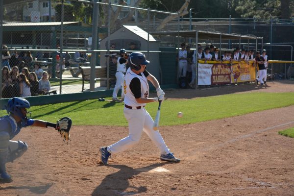 Ben R ('25) hits a single in a game during the '23-24 season at West Hills Baseball Field.