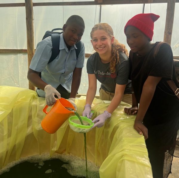 Sophomore Hannah S. (center) works in the greenhouse with students in Uganda to grow vitamin- and protein-rich Spirulina (Nov. 6-18, 2024).