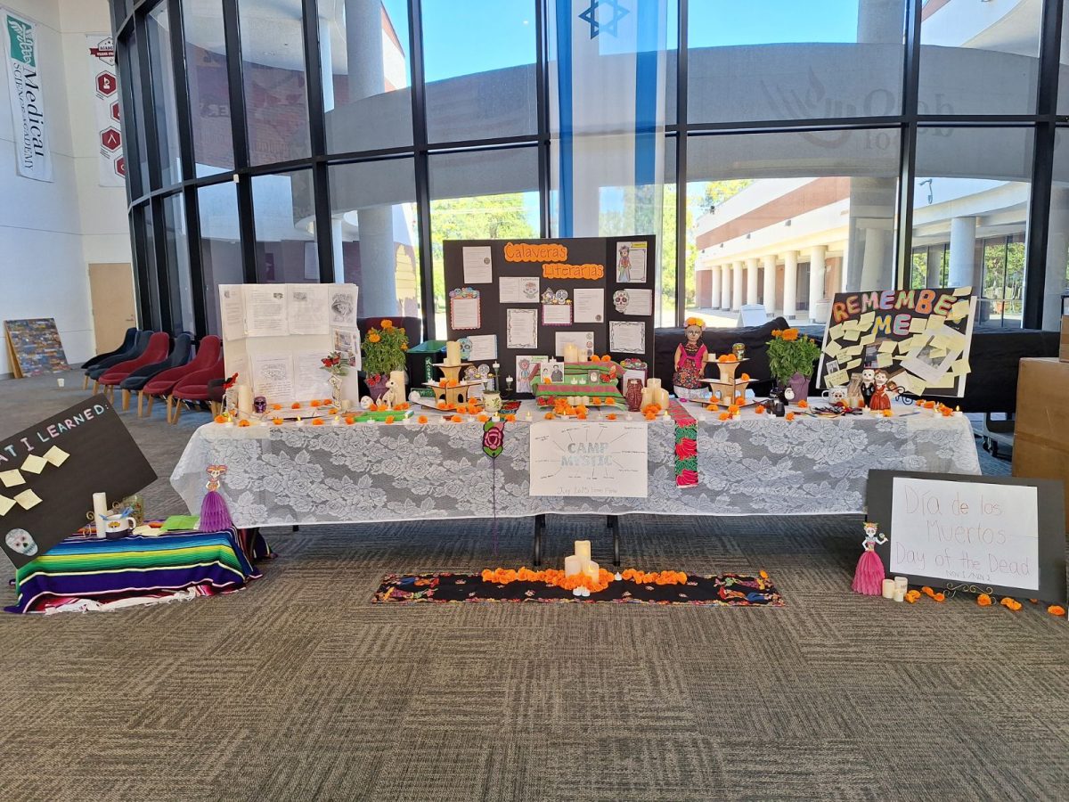 Dia de Los Muertos table set up in collaboration by the Spanish department and the ACOH club. 