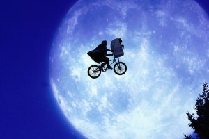 Iconic image of Elliot and E.T. on the run in the film E.T. by Steven Spielberg.