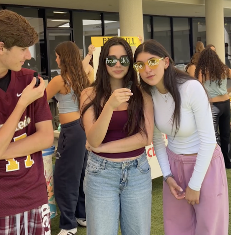 Jonah S. '28 interviews students Lielle A. '28 and Jade B. '28 at the club fair on September 17th 2026