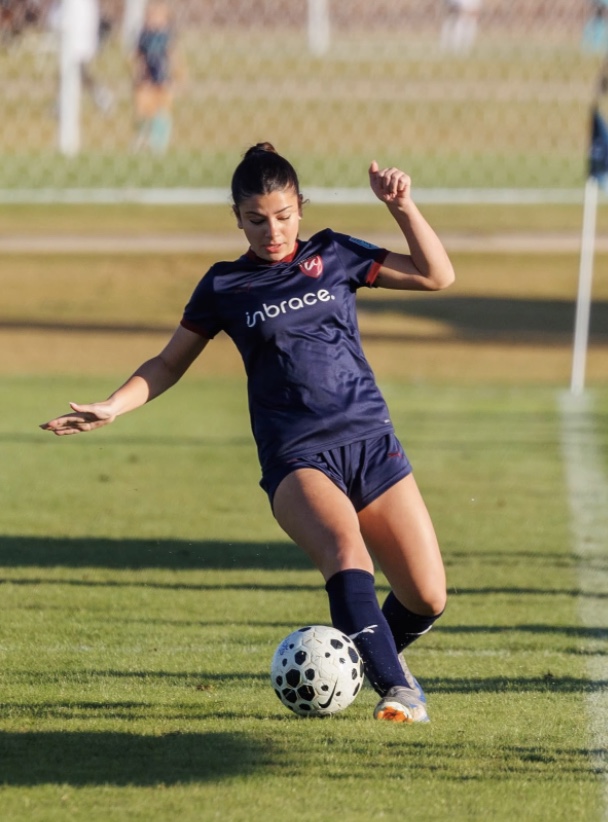 Ivy Ruberg, an ECNL soccer player playing the all at her feet during a soccer game