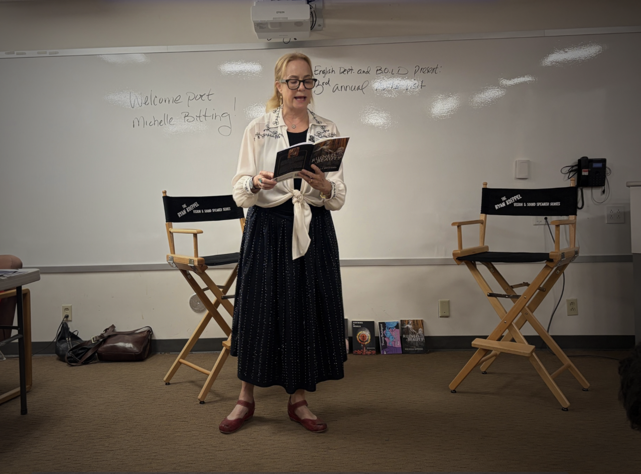 Poet Laureate Michelle Bitting speaking at dTHS program on Oct. 14, 2026.